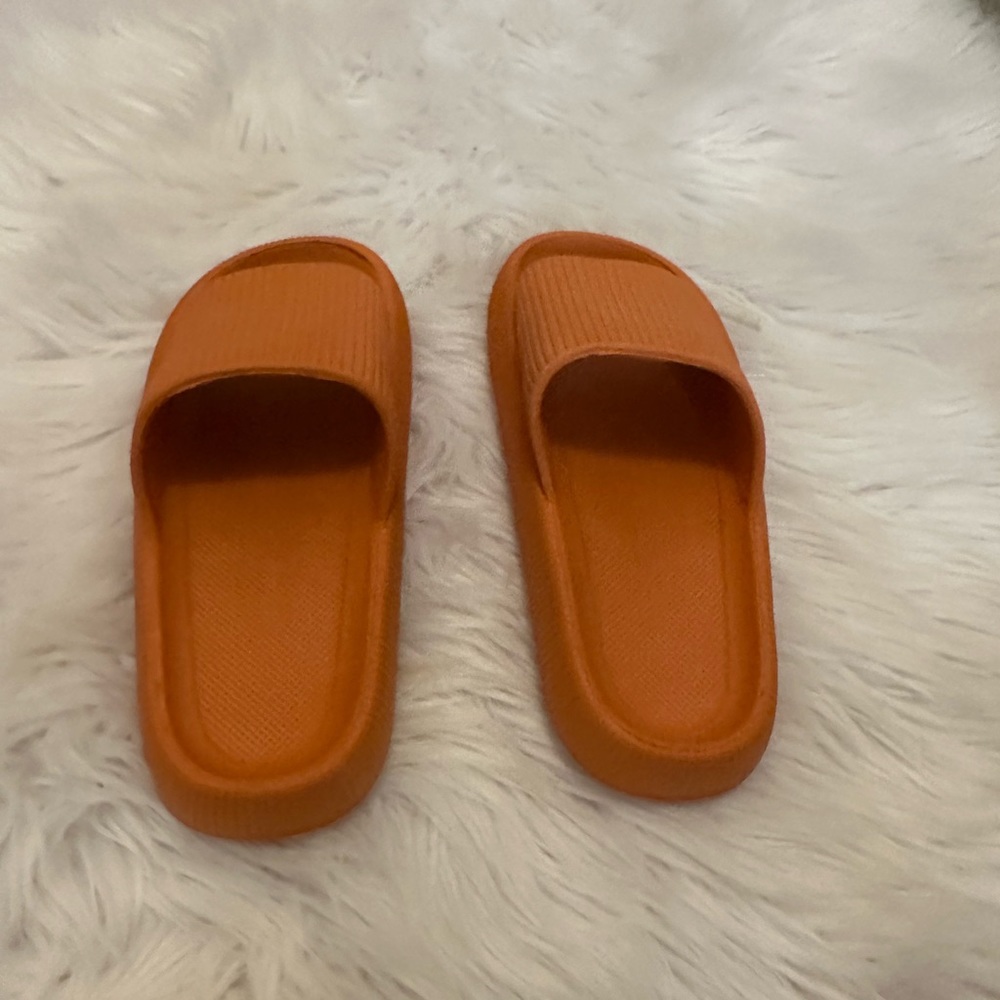 Orange poolslides size 7